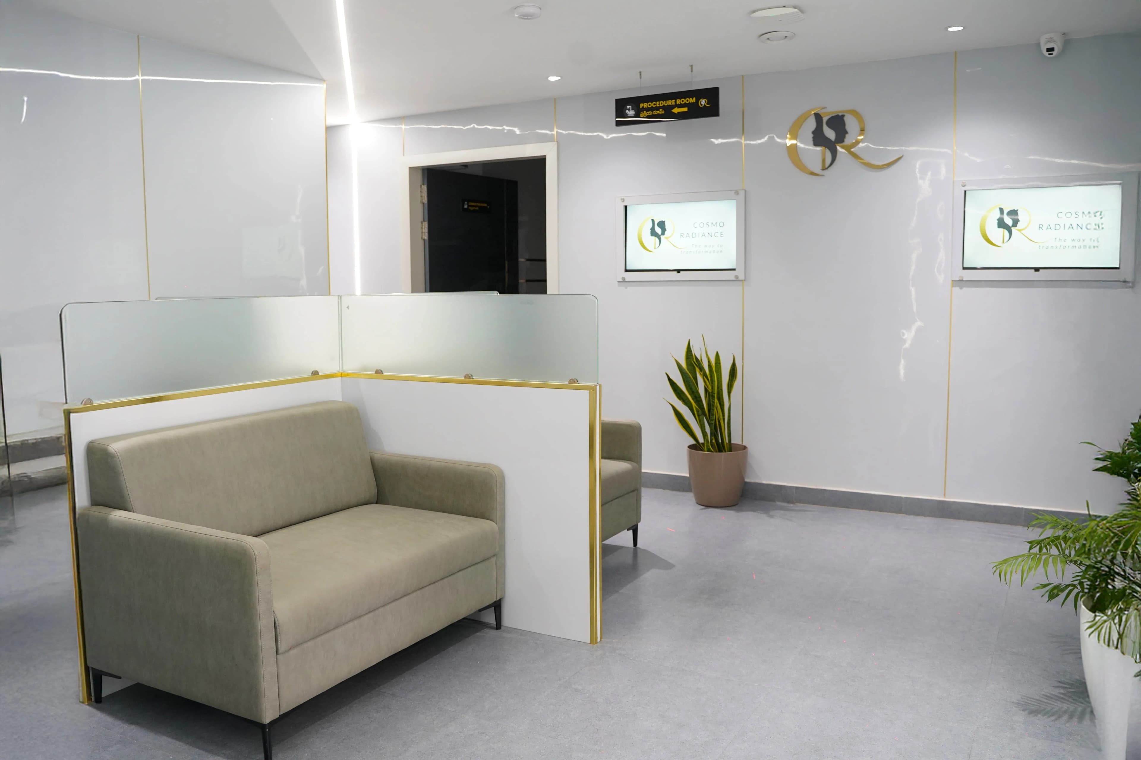 Modern patient waiting area with LCD screens for education and credentials