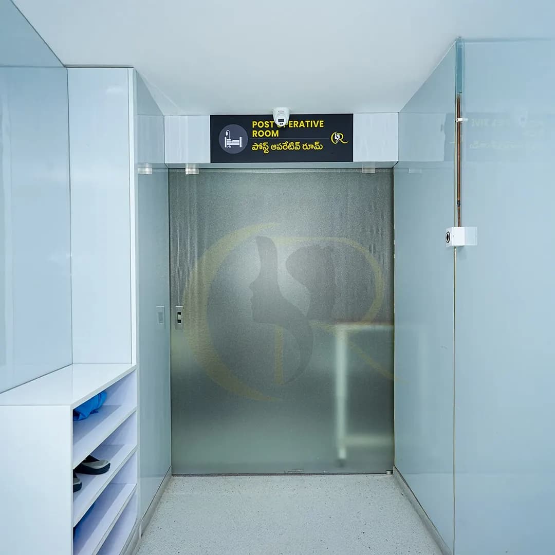 Secure entry to the sterile Post-Operative Room with restricted access signage and glass doors