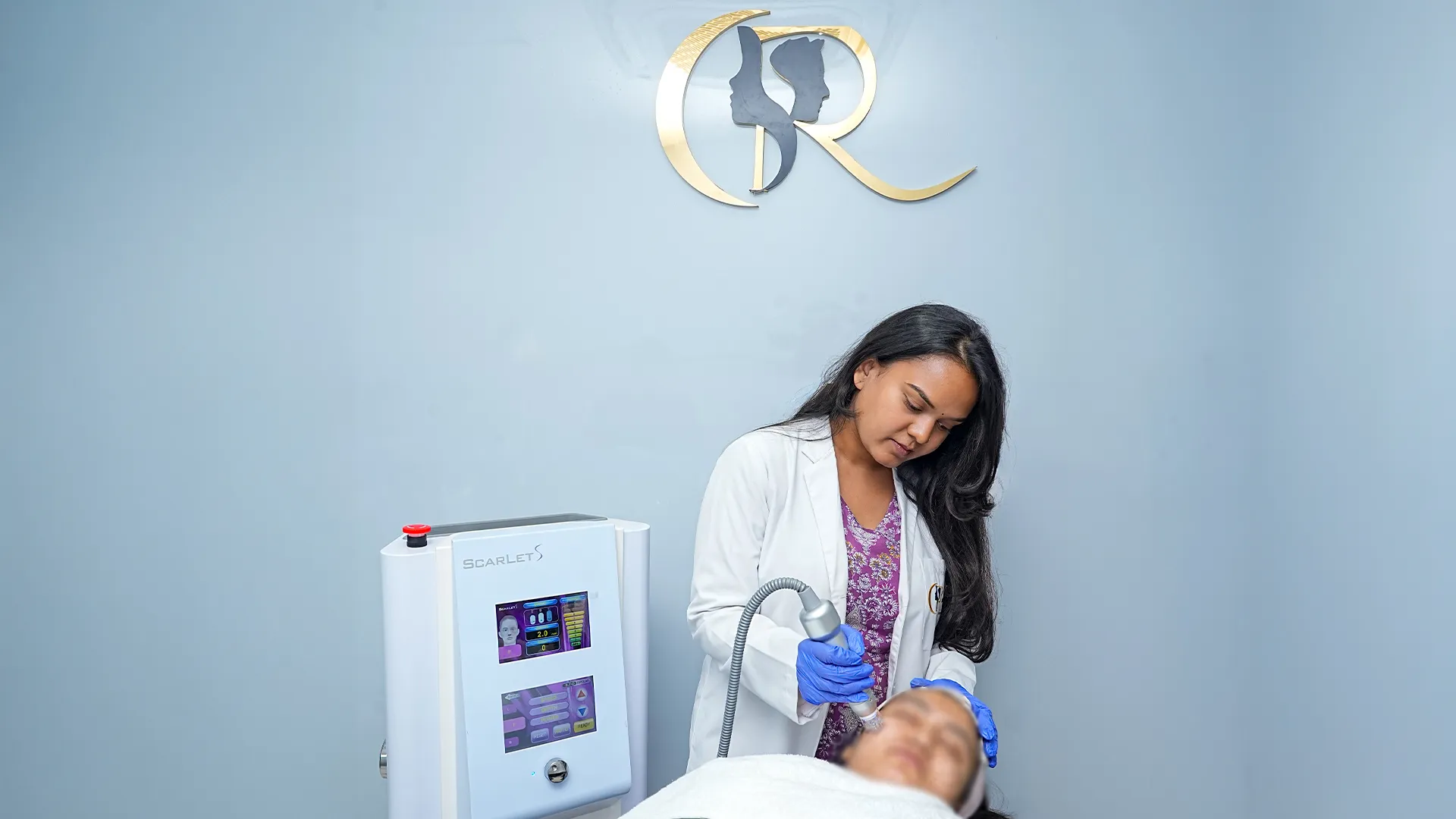 Dermatologist performing Scarlet S MNRF Skin Tightening Treatment