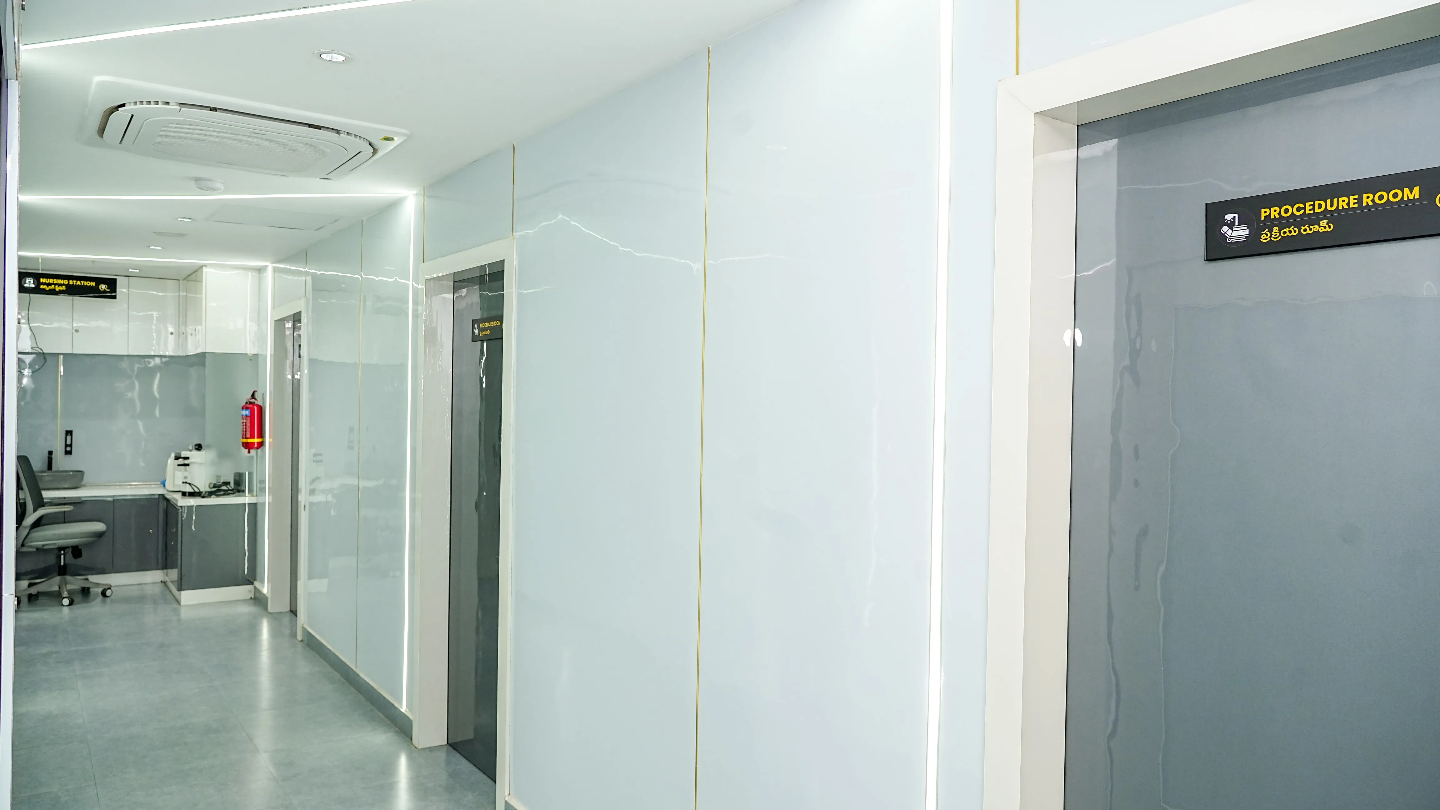 Sterile Clinic Corridor with Fire Safety Equipment and Nursing Station