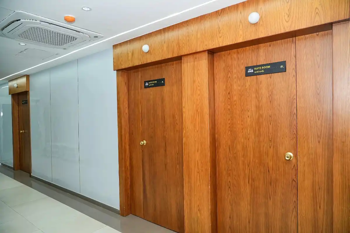 Corridor Leading to Luxury Patient Suite Rooms with Wooden Finish